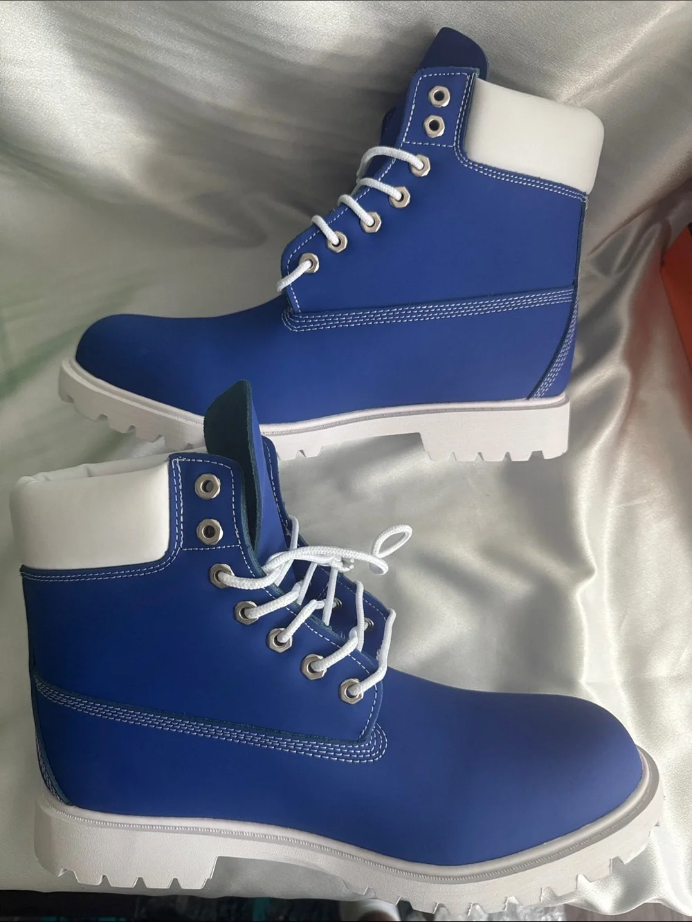 New! Timberland Premium 6-Inch boots featuring a vibrant blue nubuck upper.